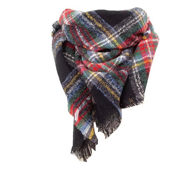 A multicolored plaid scarf with fringe, displayed on a white background.