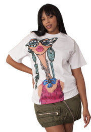 Woman wearing a white t-shirt with a colorful graphic design.